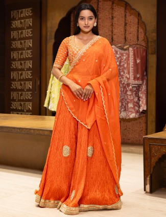 Orange silk lehenga choli for wedding wear