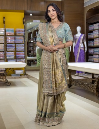 Golden silk saree for wedding celebration